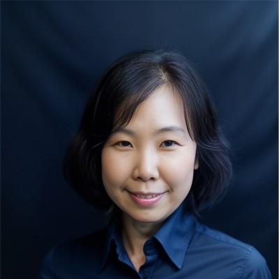 Tomomi Tanaka, PhD, professional headshot.